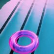 pink inflatable ring on pool